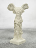 Statue Nike of Samothrace victory goddess figure...