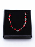 Roman link chain with red stones and pearls