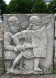 Relief legionary mural, legionaries with helmet, museum replica, ancient roman wall decoration